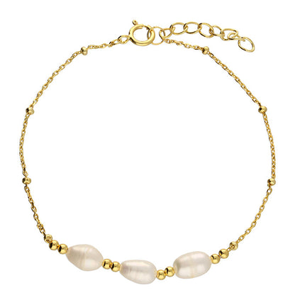 Gold bracelet with pearls on a white background