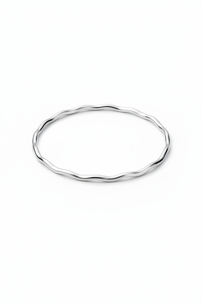 Silver wave bangle on a white background