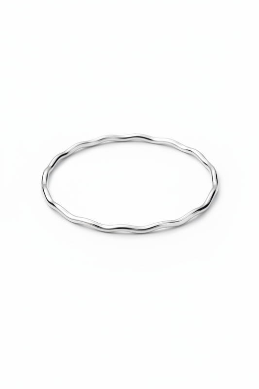 Silver wave bangle on a white background