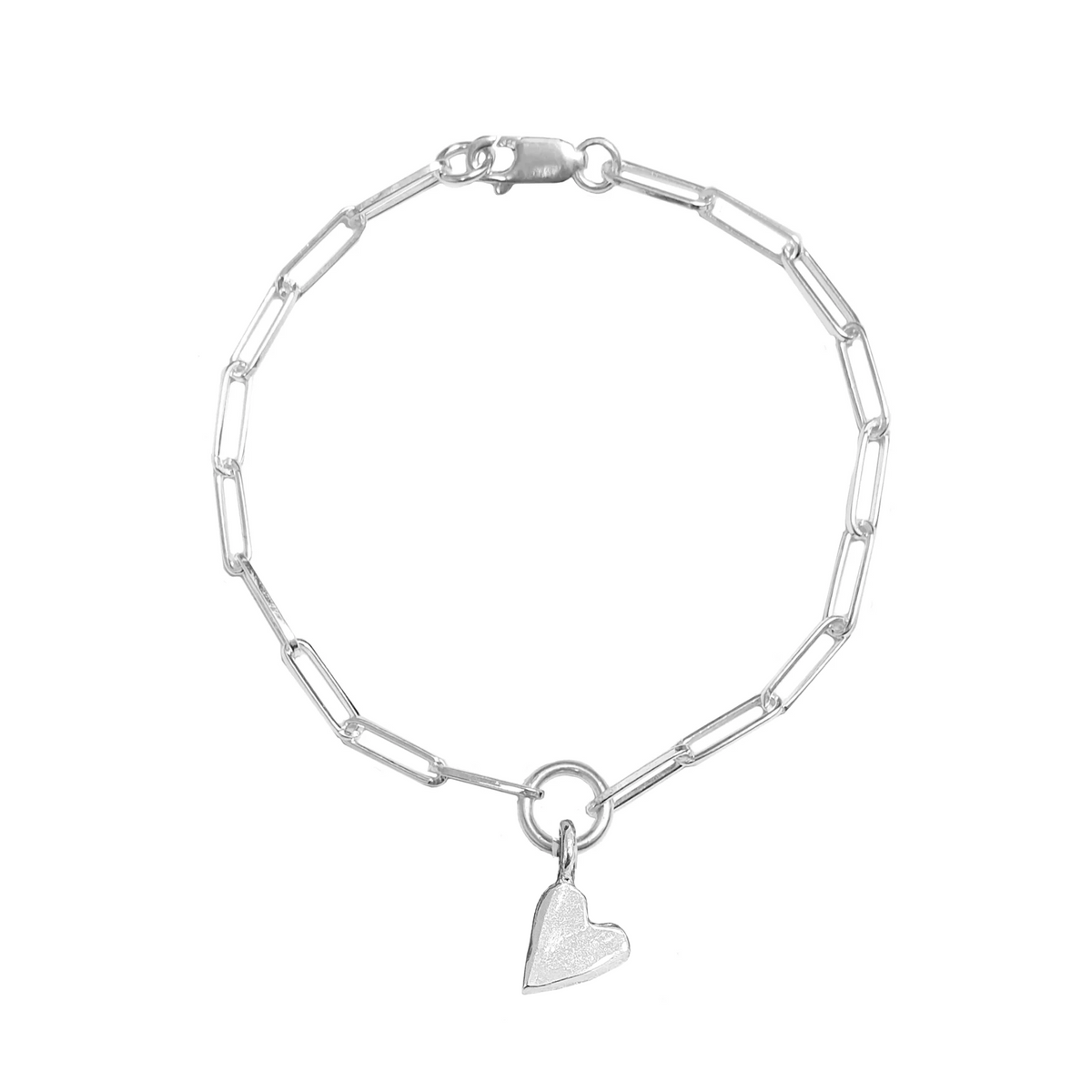 Sterling silver elongated-link bracelet with a heart charm and lobster clasp on a white background.