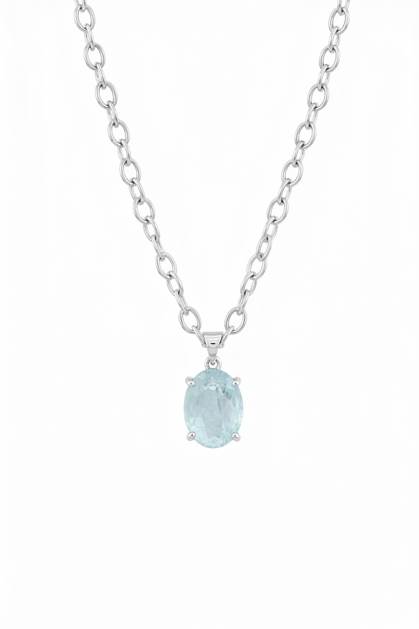 Sterling silver oval-link necklace with an oval pale-blue aquamarine pendant in a four-claw setting on a white background