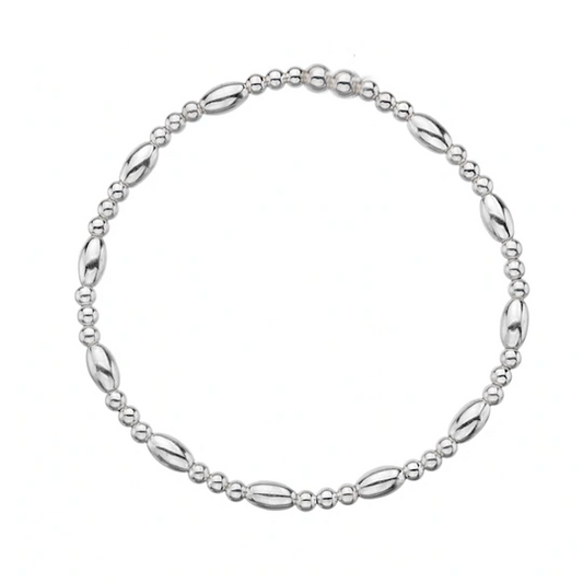 Silver beaded stacking bracelet on a white background 