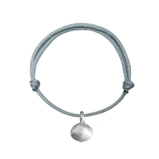 A sterling silver bracelet with an adjustable rope-like chain and a shell attachment, handmade in Cleethorpes.