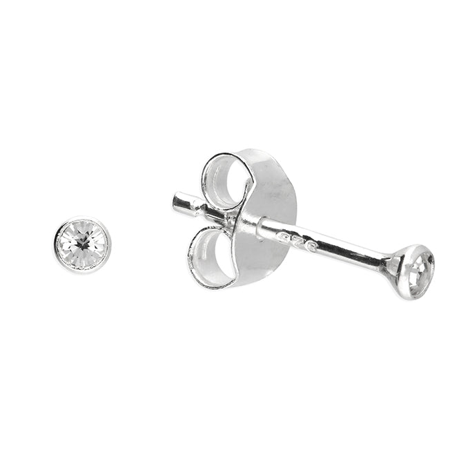 A pair of silver stud earrings, with one earring shown front-facing to display the round clear gemstone bezel, and the other shown from the side/back to display the butterfly clutch and post, on a solid white background.
