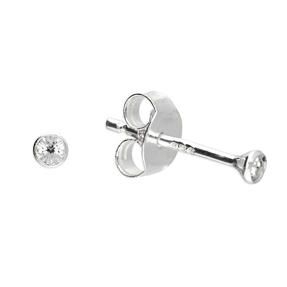 A pair of silver stud earrings, with one earring shown front-facing to display the round clear gemstone bezel, and the other shown from the side/back to display the butterfly clutch and post, on a solid white background.
