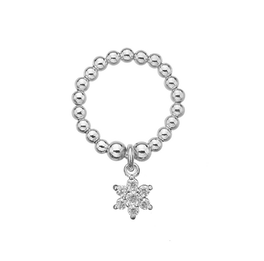 Silver beaded ring  with a sparkle flower charm on a white background