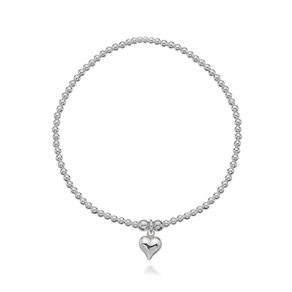Heart shaped charm beaded bracelet on a white background 
