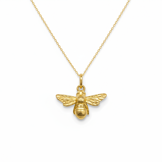18ct gold-plated necklace with a detailed bumble bee pendant and outstretched wings on a white background