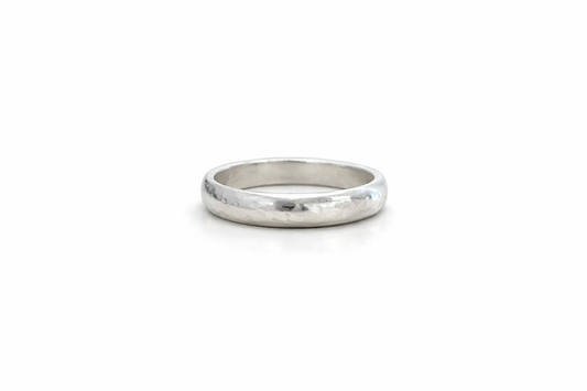 Sterling silver Hammered D Band ring with a rounded profile and textured hammered finish on a white background