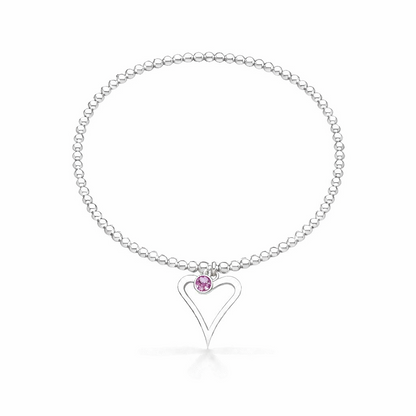 Silver birthstone bracelet with a heart-shaped charm on a white background
