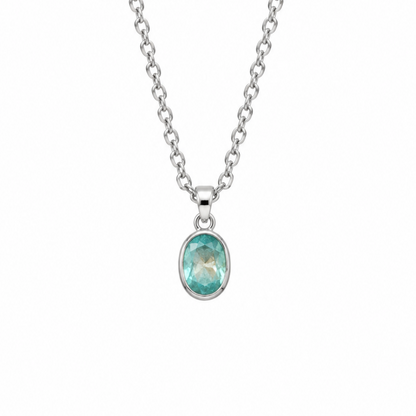 A silver belcher chain necklace with an oval bezel setting holding a light green kyanite stone, shown against a plain white background.