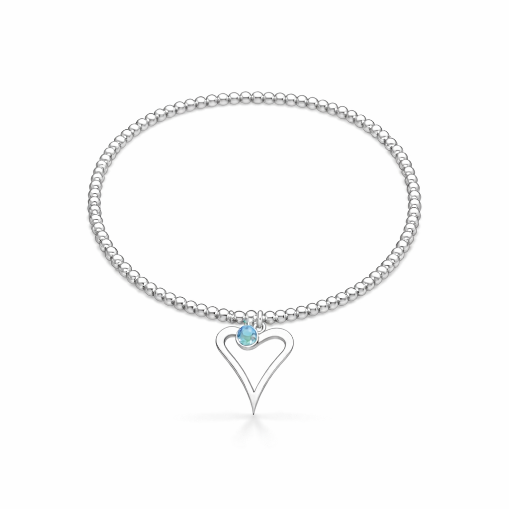 Silver birthstone bracelet with a heart-shaped charm on a white background