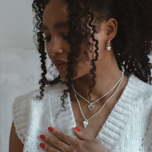chunky silver necklace featruing a silver handmade heart charm