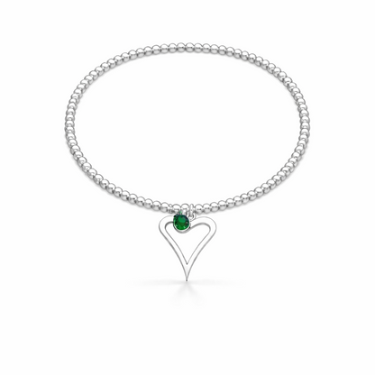 Sterling silver beaded bracelet with an open heart charm and round green May birthstone charm on a white background