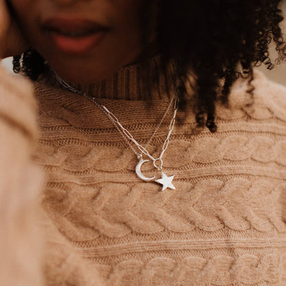 sterling silver trace chain wih a midi star pendant on a model 