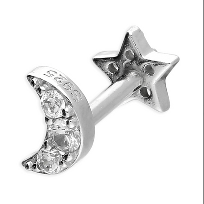 Moon and star cartilage stud o a white background 