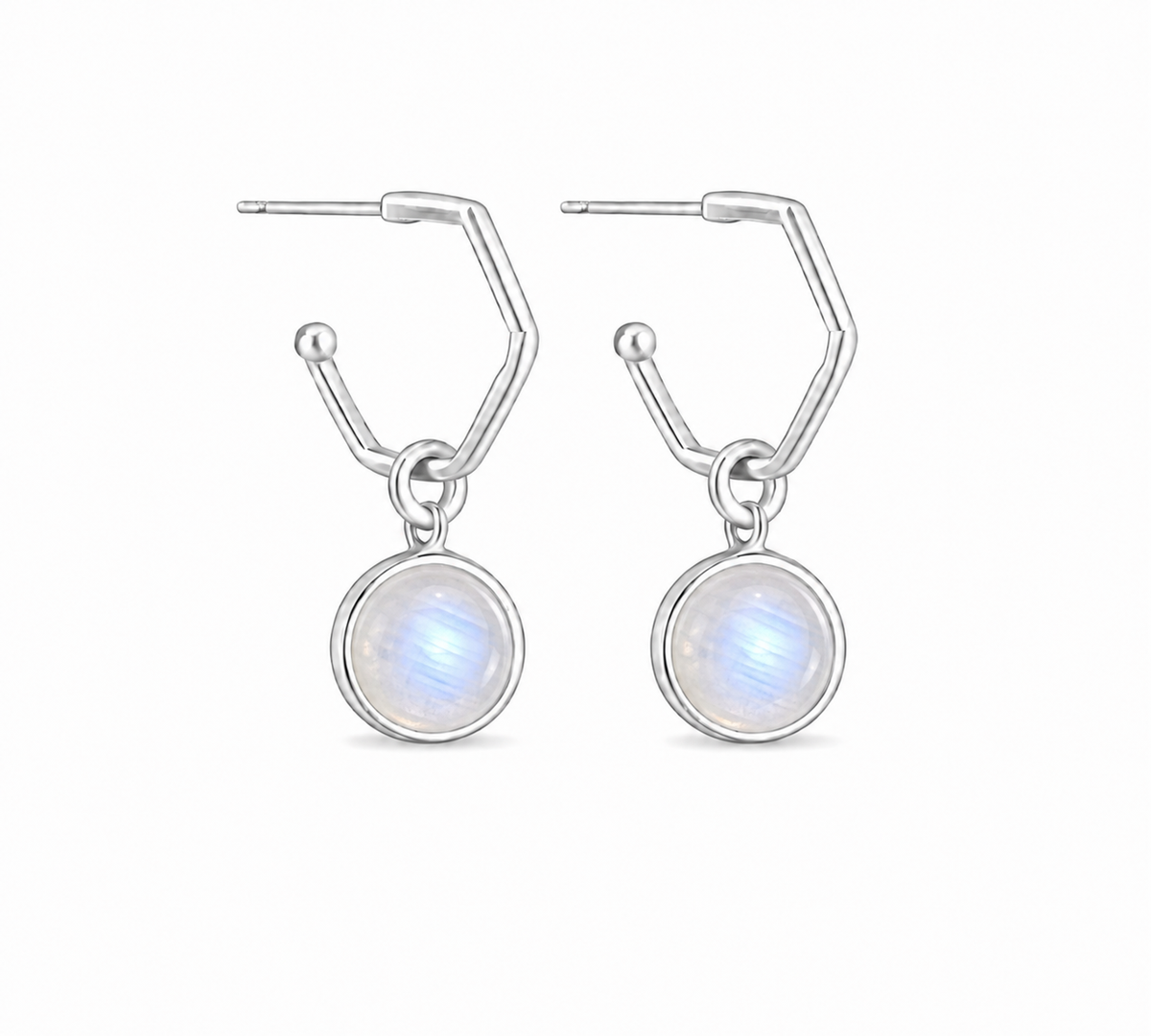 A pair of silver huggie hoop earrings with circular white moonstone dangle charms, shown on a clean white background.