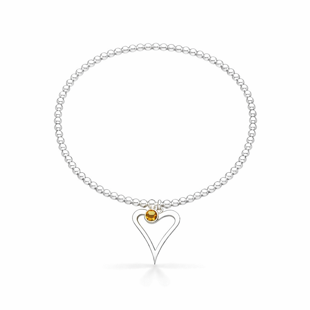 Silver birthstone bracelet with a heart-shaped charm on a white background