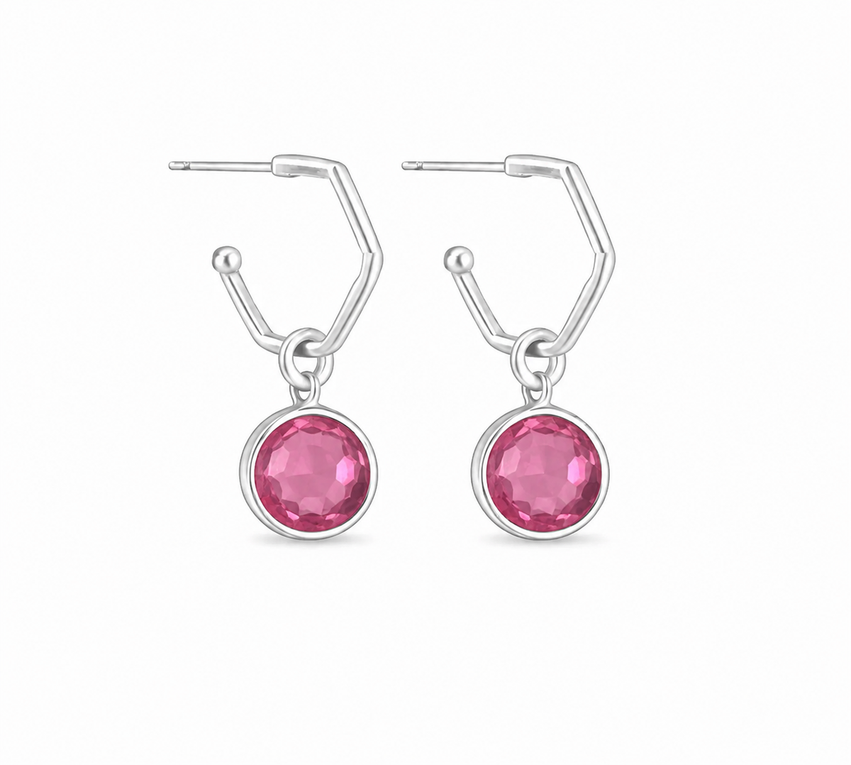 a pair of silver hoops featruing round pink tourmaline charms. On a white background
