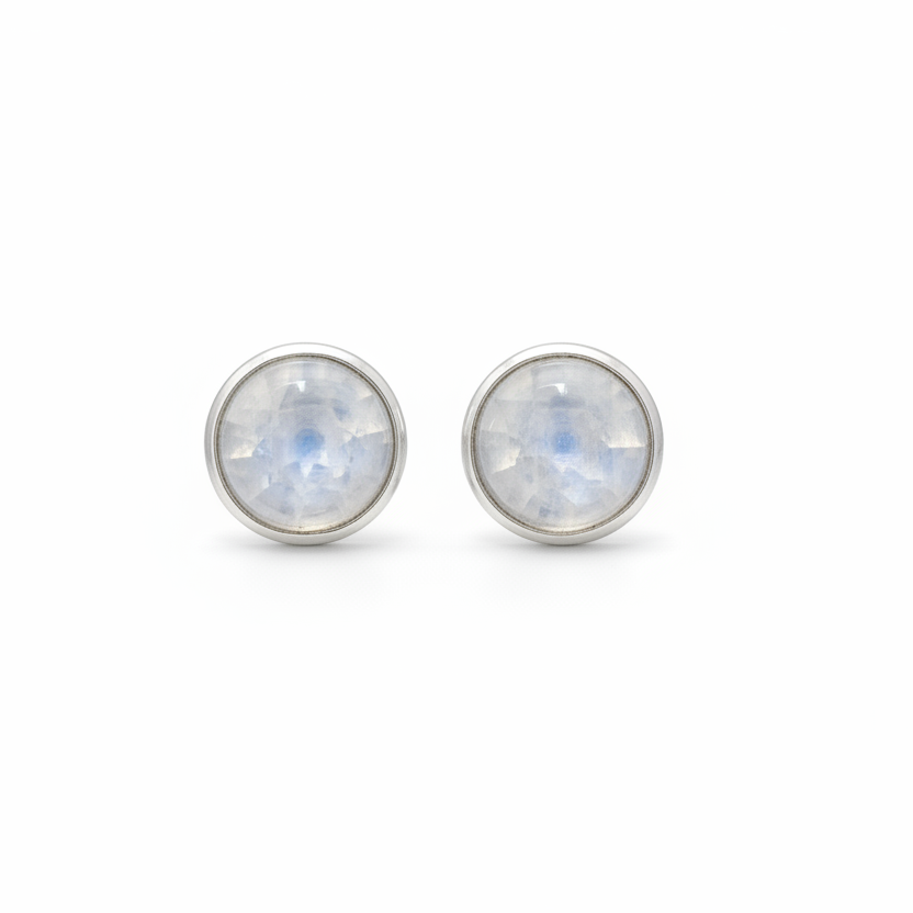 Pair of silver stud earrings with rainbow moonstone stones on a white background