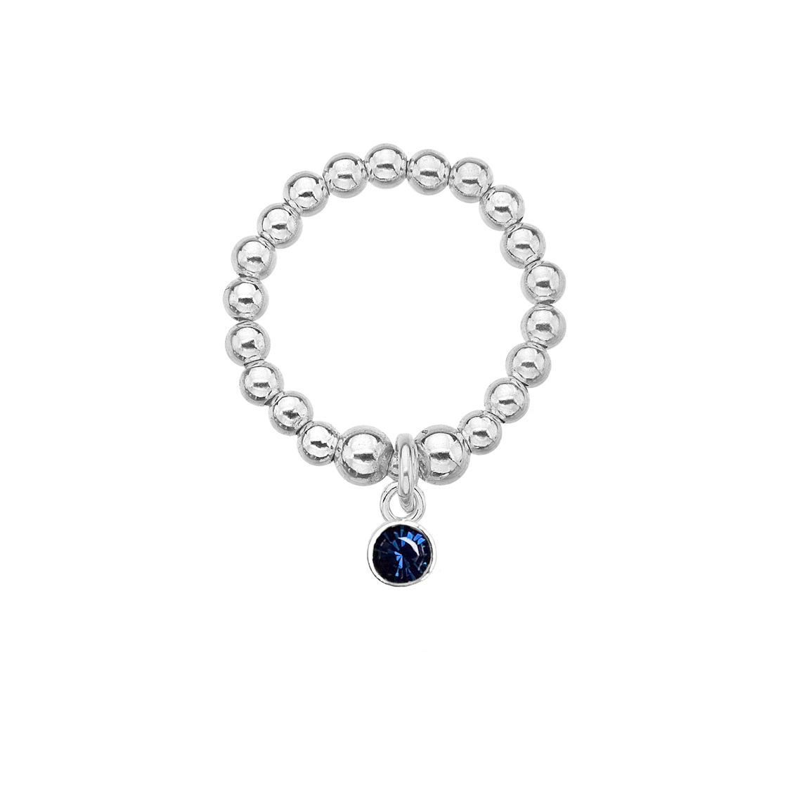 Silver beaded ring with a blue gemstone charm on a white background