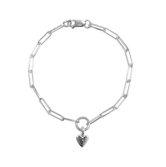 Teeny heart trace bracelet on a white background 