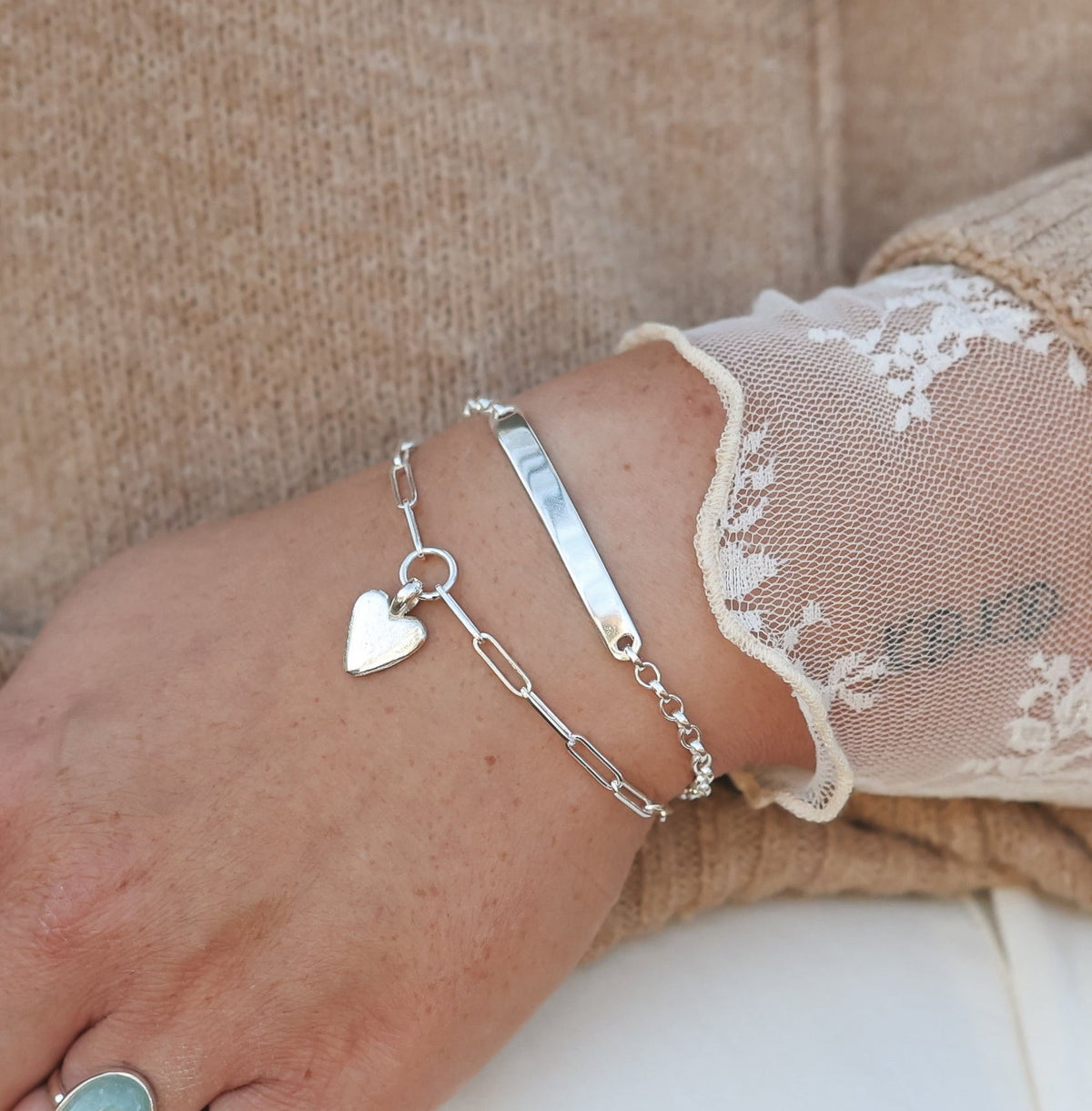 terling silver True Love trace bracelet with a heart charm with idenity bracelet